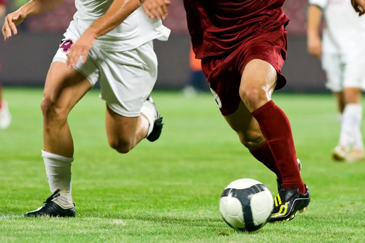 Men playing soccer