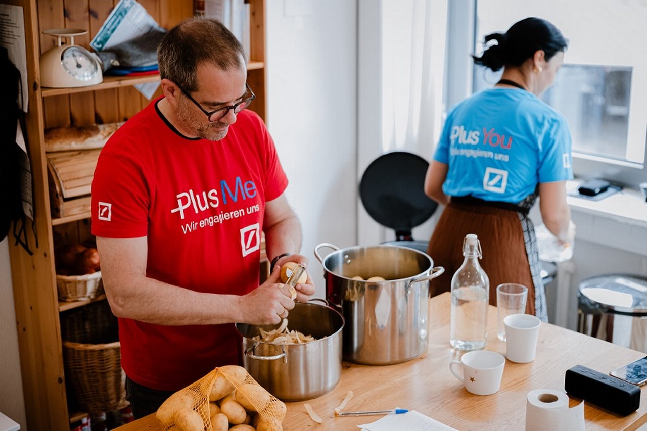 Volunteers cooking together