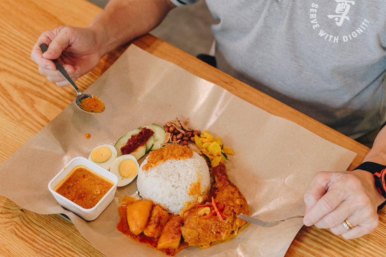 Eating chicken rice