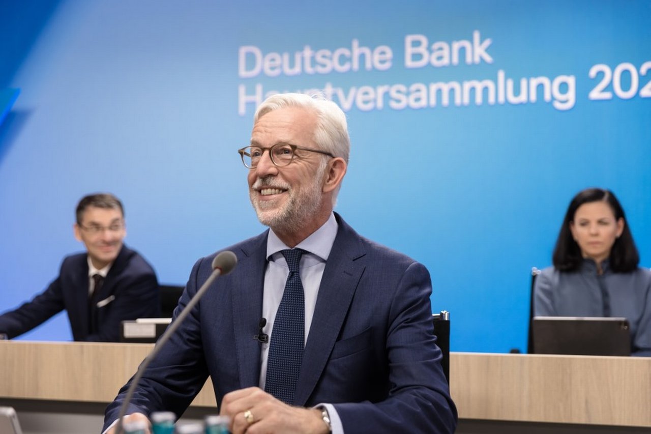 Karl von Rohr with Bernd Leukert and Christiana Riley in the background