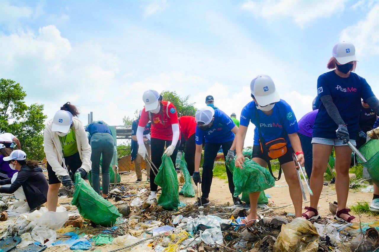 Volunteers clean a beach in Vietnam