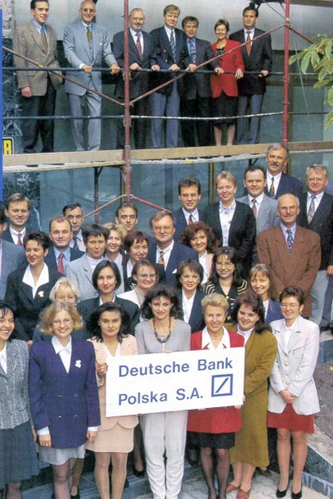 Employees in front of the newly established representative office in Warsaw