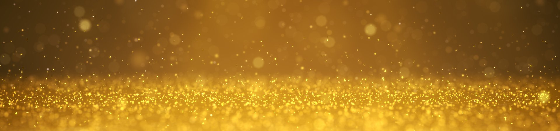 Sparkling gold glitter background with bokeh effect