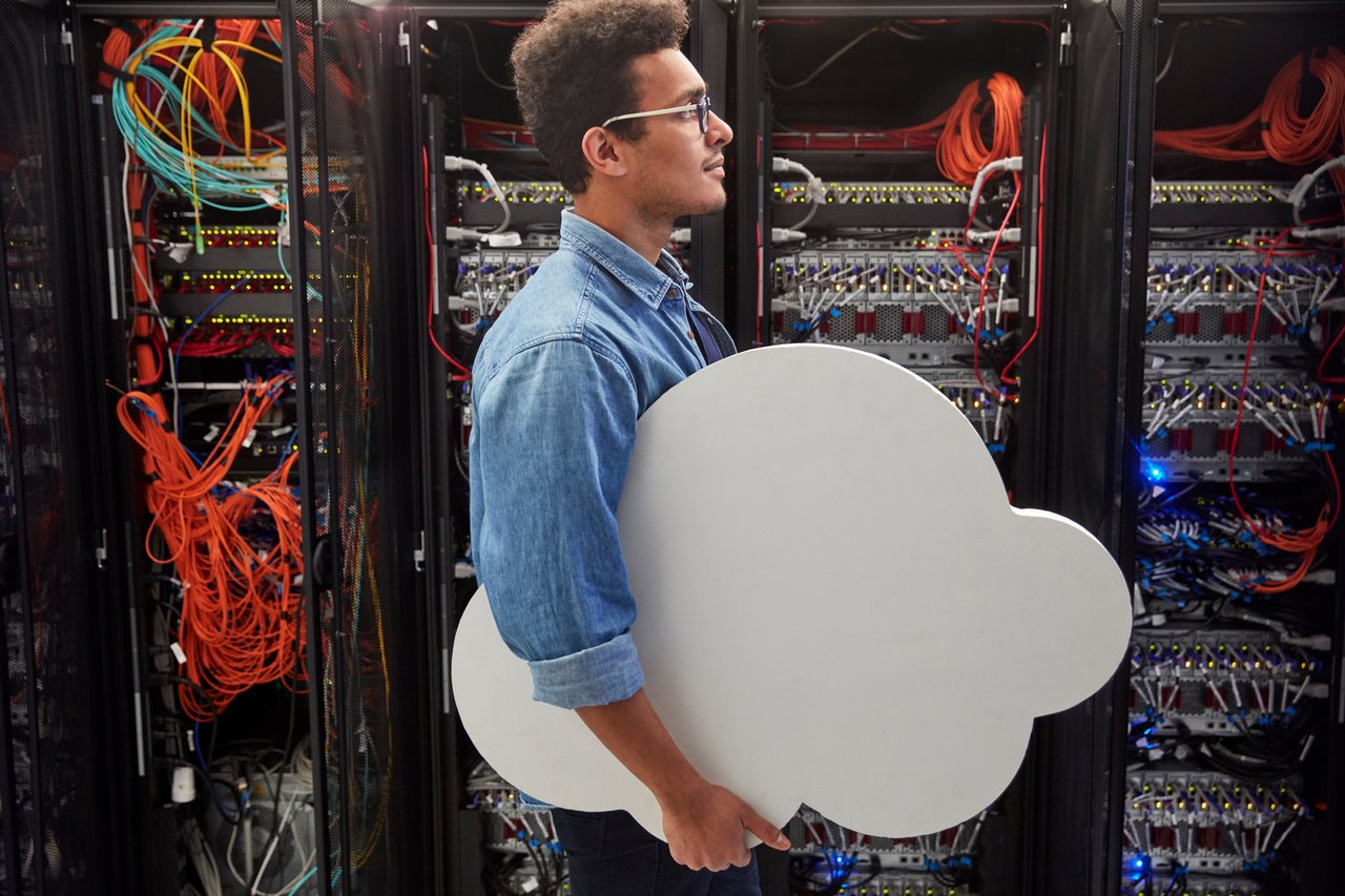 Man with cloud in a data centre