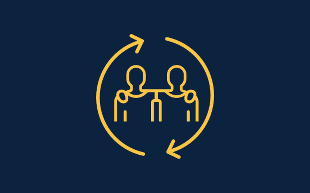 Symbol in the form of two people arm in arm.