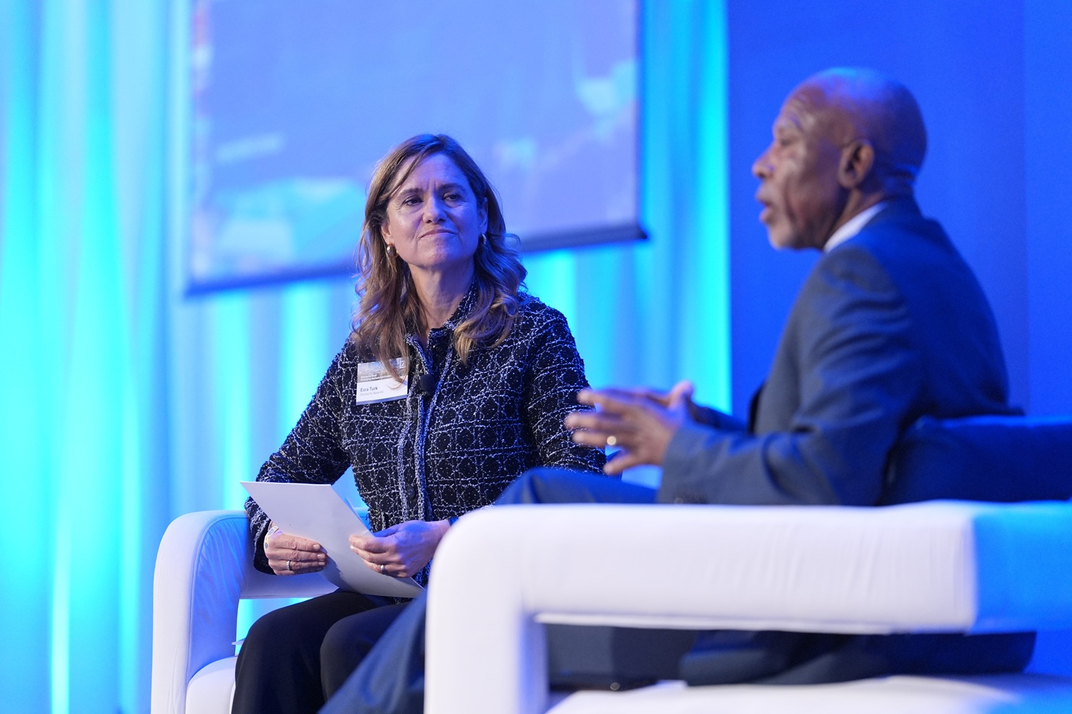 Esra Turk and Lesetja Kganyago sitting opposite each other and speaking